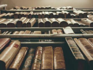 library of books illustrating the artice on 15 square DOES CIRCUMCISION PREVENT PROSTATE CANCER?