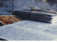 hand written letters on a desk, letter to my past self